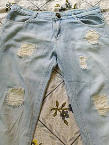 Short Ankle Length Ripped Jeans For Women