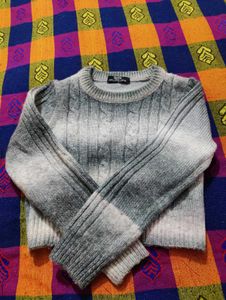 Stylish grey and white sweater