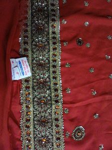 A Rust Colour Dress Material.