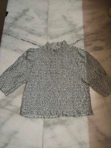 Smock top with flower detail