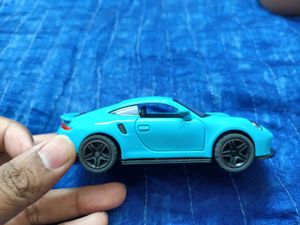 Teal Porsche Toy Car