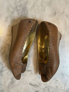 Stylish Peep Toes Beige Colour Leather Wedges