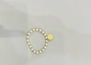 3 Beaded Pearl Bracelets With Charms