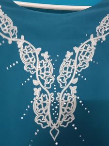 New Teal Tunic, pattern sleeves white embroidery
