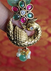 A New Black Bead Chain With Peacock Lovket