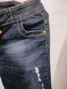 Distressed Denim Capri Pants
