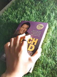 Rich Dad By Robert T. Kiyosaki.