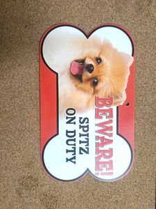 Beware Spitz On Duty Sign