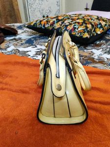 butter yellow handbag