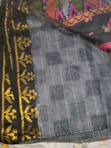 i am selling black golden saree