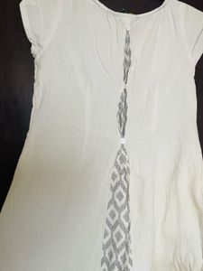 White Dress with Geometric Accent
