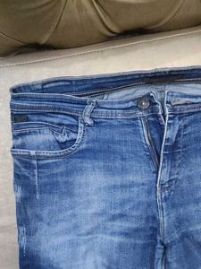 Distressed Denim Jeans