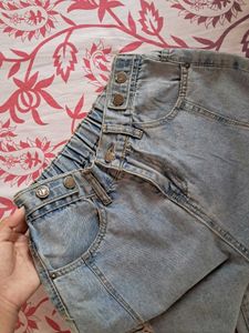 Distressed High-Waisted Denim Jeans