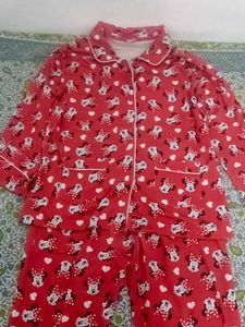 a red night suit gives cozy vibe wth detailings of