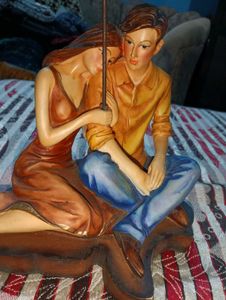 Vintage Couple Under Umbrella Figurine