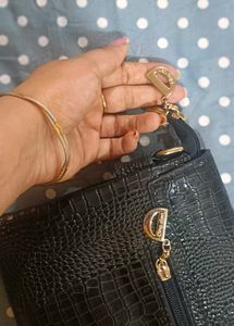 Black Clutch with Gold Accents