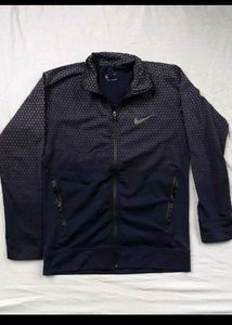 2 NIKE JACKETS 1 SHOE AND TROUSER.