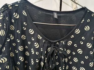 Elegant Sheer Print Top