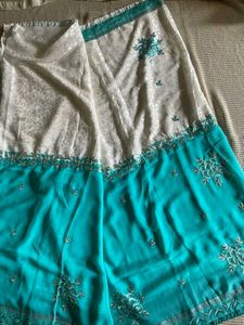Half Green And White Saree With Stitched Blouse