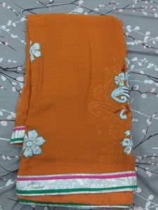 Elegant Orange Embroidered Saree