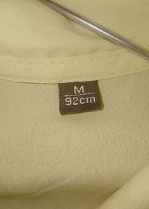 Elegant Tie-Neck Blouse and pastle yellow color