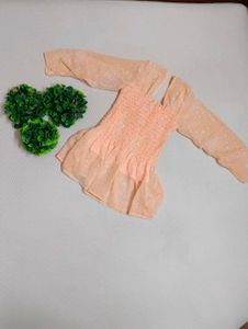 Peach Smocked Peplum Top