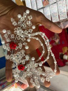 White Coloured Pearl And Stone Tiyara With Rose