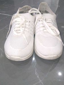 white sneakers.
