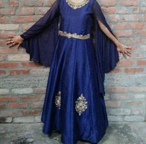 Festive Gown With Extended Cape Sleeves