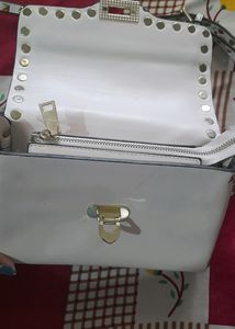 Cream Leather Exterior Bag.