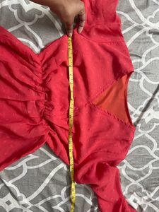 Coral Peplum Top