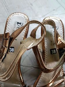 Metallic Platform Heels with Bow Detail