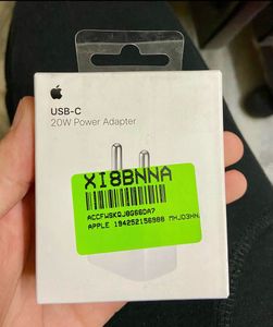 Orignal iphone adopter with bill from a