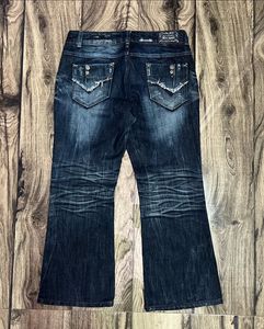 Distressed Bootcut Jeans