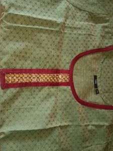 A kurtha of XXL size having flora tag and design o