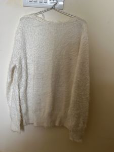 big white fuzzy sweater