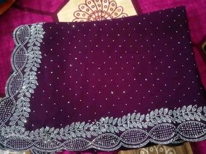 Georgette fabric saree with hevay daimond work Nam