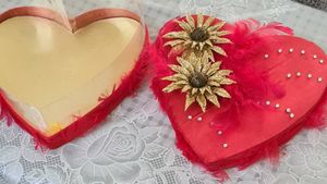 Red heart shaped satin box