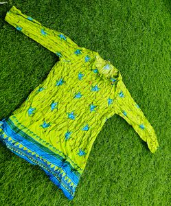 Flourescent green 💚 tunic with blue origami birds