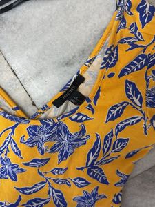 Forever 21. Floral Yellow Back Criss Cross  Dress