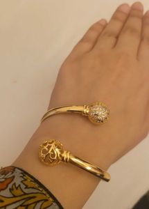 Twisting Gold Color Bangle