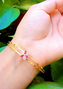 Floral Design Gold Bangles