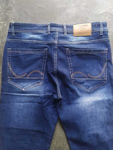 Ripped Blue Denim Jeans