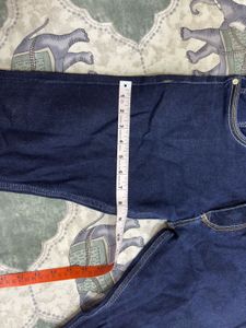 Combo of green shirt and denim jeans