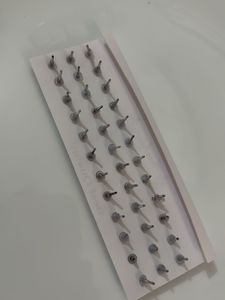 18 pairs of Floral studs