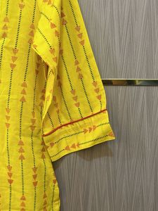 Yellow Printed Kurta And Red Pallazzo
