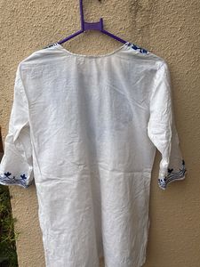 Short Kurti With Blue Work On It