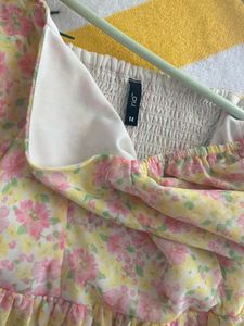 cute yellow color top with floral print