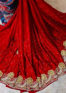 Red. heavy Embroidered. expansive 💯 saree