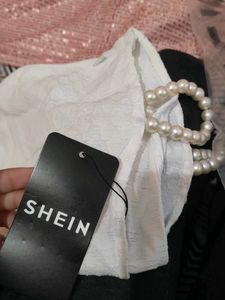 Bodycon Mini pearl sleeve dress 🤍🪽